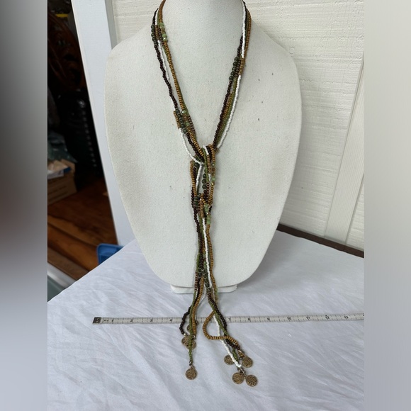 Long multi strand necklace with neutral tone beads and gold dangles - Picture 4 of 6